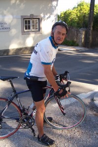 A portuguese man on his racing bicycle.